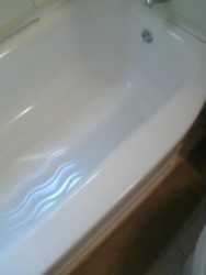 Dallas Bathtub Services refinished the tub with a new surface.